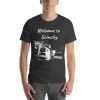 Unisex t-shirt that says "Welcome to Grimsby" on it with a black and white picture of a building in Grimsby.