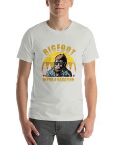 Unisex t-shirt with a picture of Bigfoot in sunglasses on it. On the shirt it also says "Bigfoot needs a vacation"