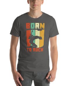 Unisex t-shirt that says "born to rock" on it in stylised writing. The t-shirt also has a silhouette of someone playing guitar on it.