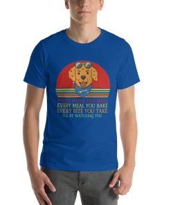 Unisex t-shirt with a picture of a dog on it. Underneath the dog it says "every snack you make, every meal you bake, every bite you take, I'll be watching you."