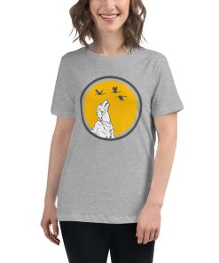 Women's t-shirt with a picture of a dog looking at ducks on it.