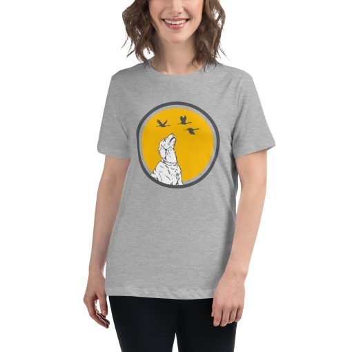 Women's t-shirt with a picture of a dog looking at ducks on it.